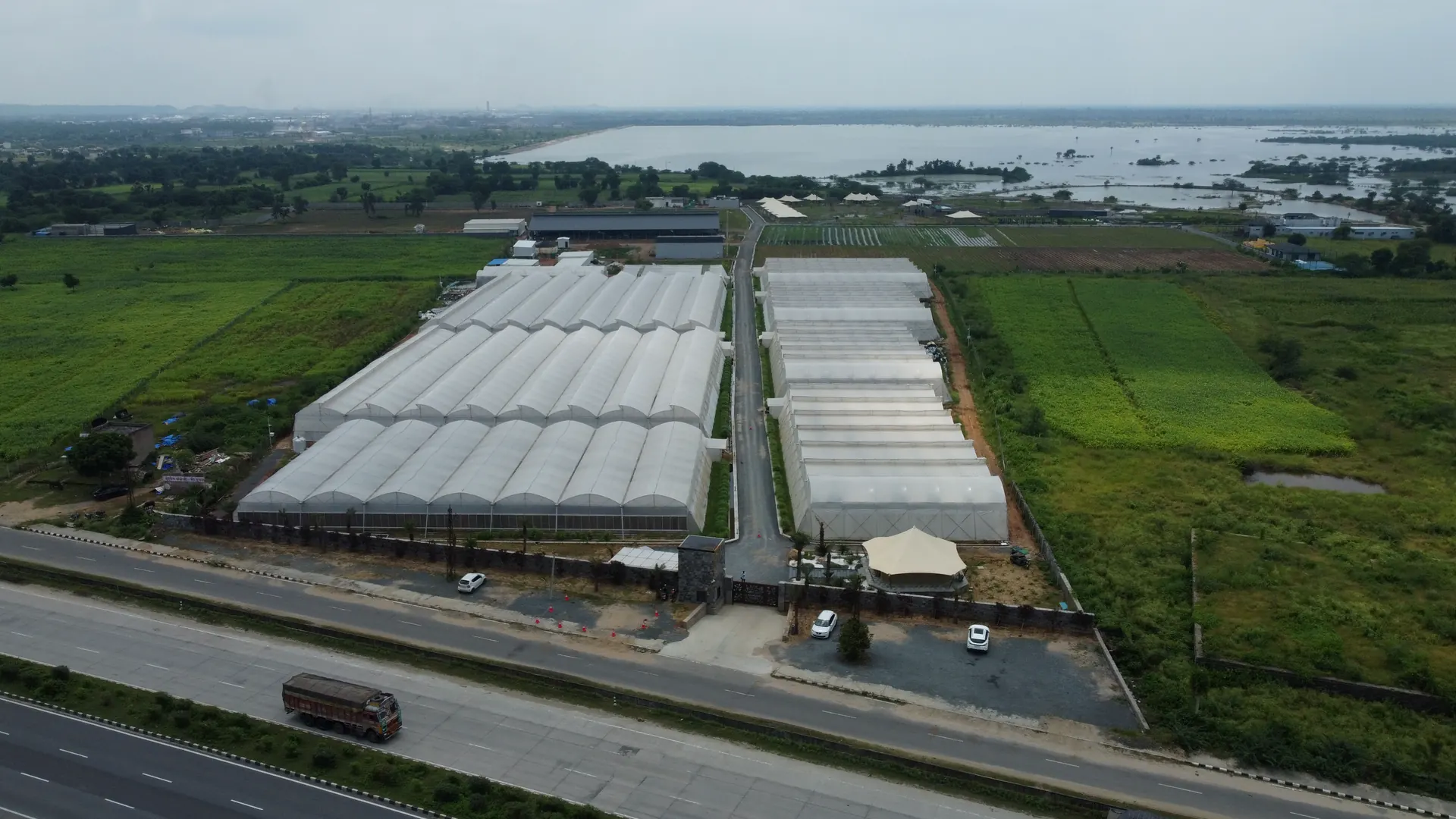 Aerial view of a multi-span naturally ventilated polyhouse cluster